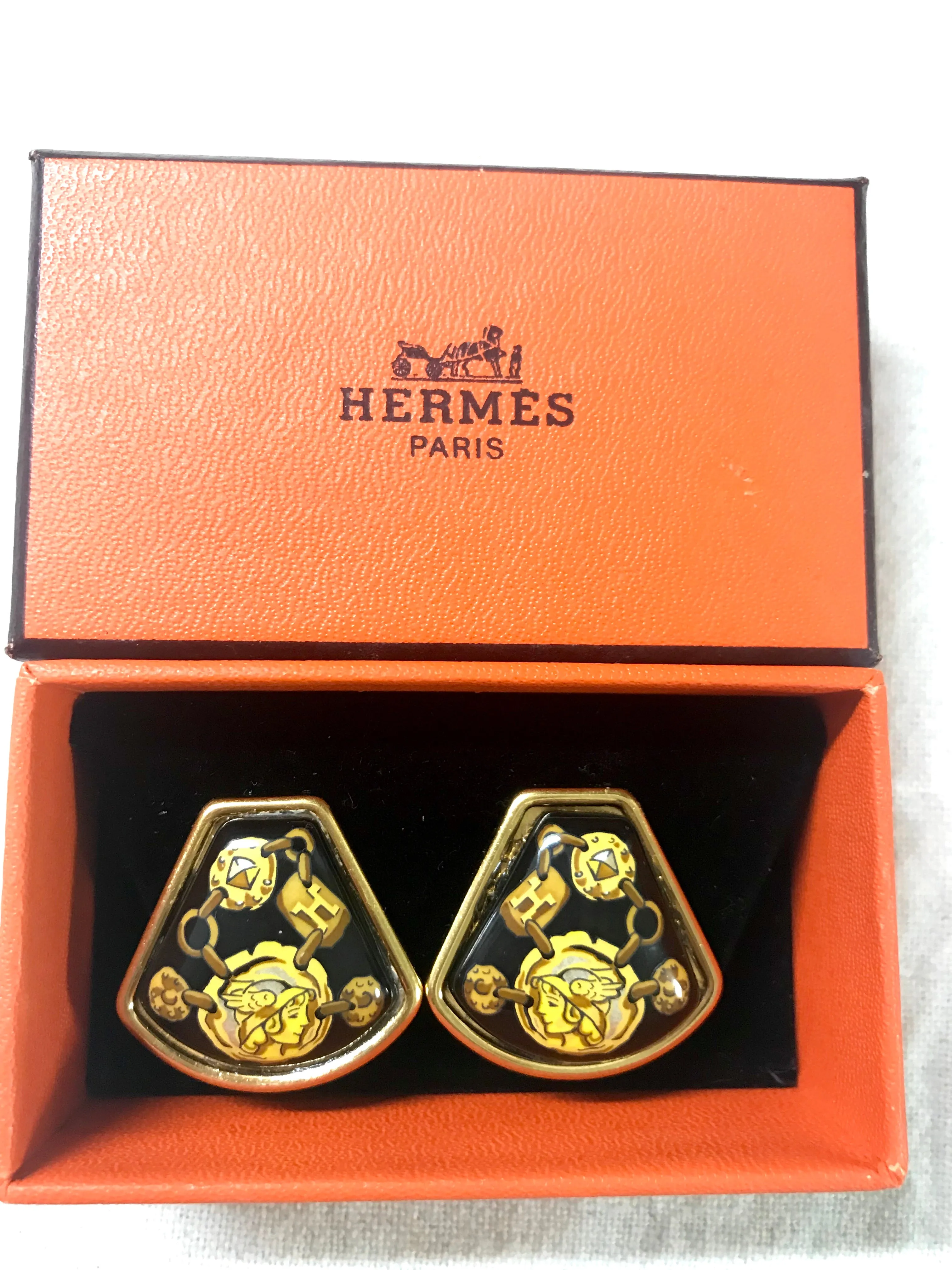 Vintage Hermes cloisonne golden earrings with black and yellow chain, stud, H logo, mademoiselle design. Fan shape enamel classic jewelry.